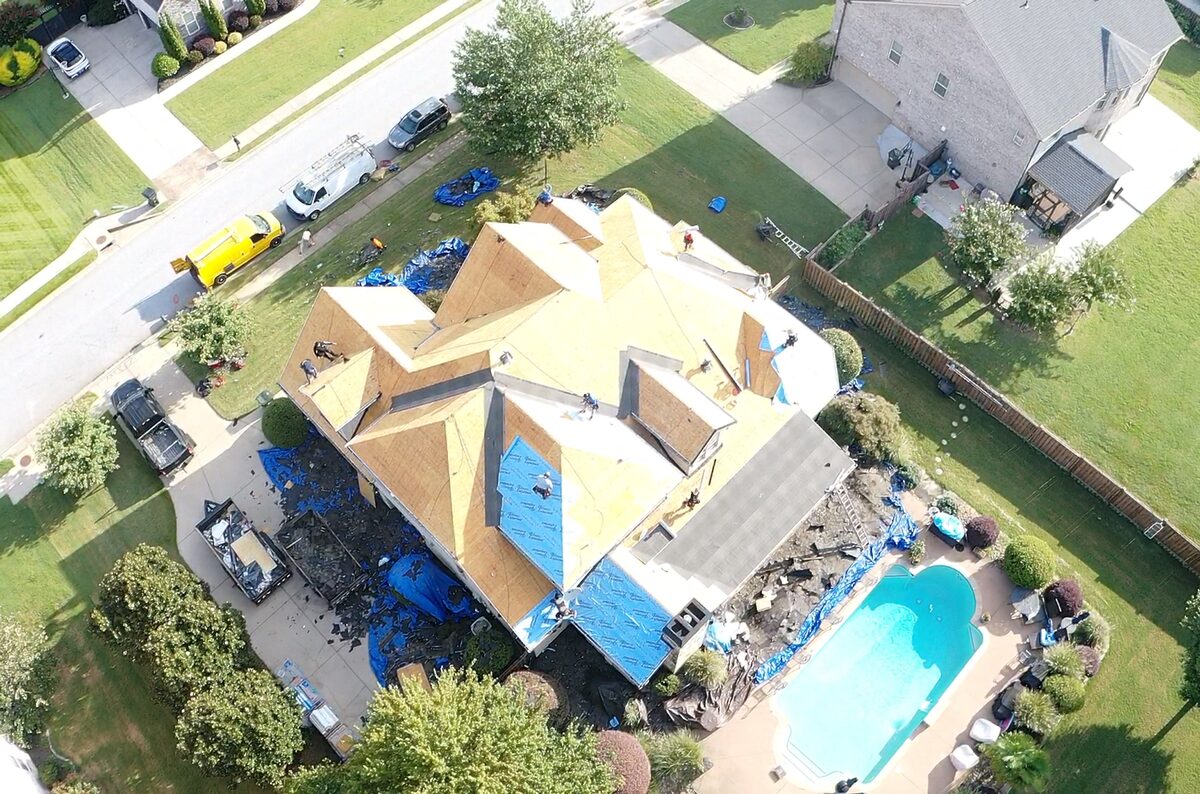 Acme Roofing crew working on a roof project