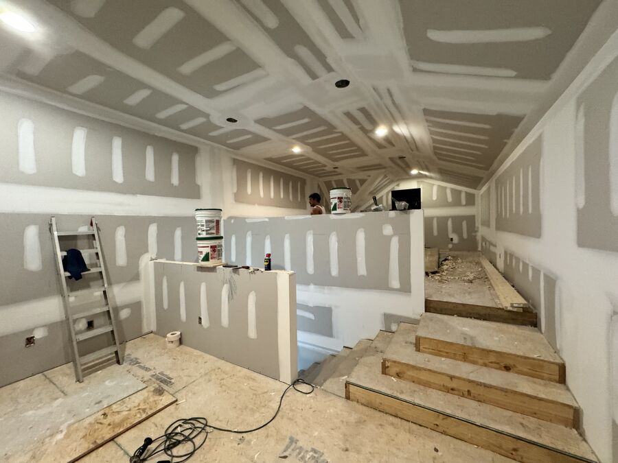 Interior framing and drywall finishing during a renovation project